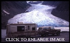 THE RIG IN FRONT OF A GLACIER
