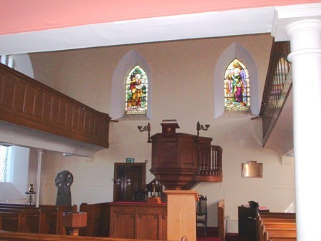 INSIDE KIRKINNER CHURCH WITH THE ANCIENT CROSS IN THE CORNER
