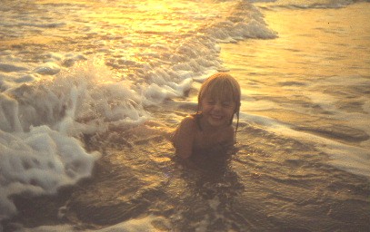 Sarah splashing in the waves 