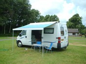 AWNING AND THE BACK OF THE VAN