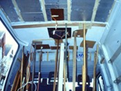 HOLDING UP THE CEILING BOARDS WITH PROPS